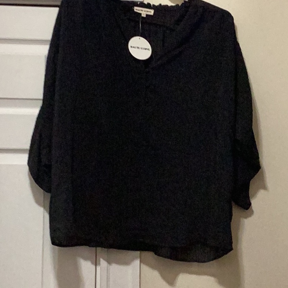 Haute Curve sheer black top